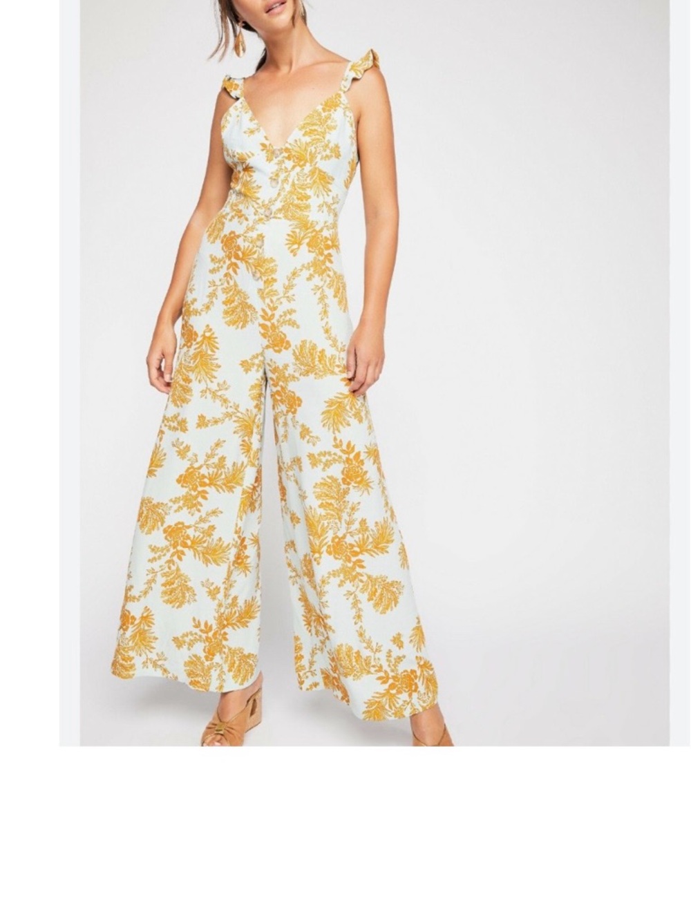 free people be the one floral jumpsuit
